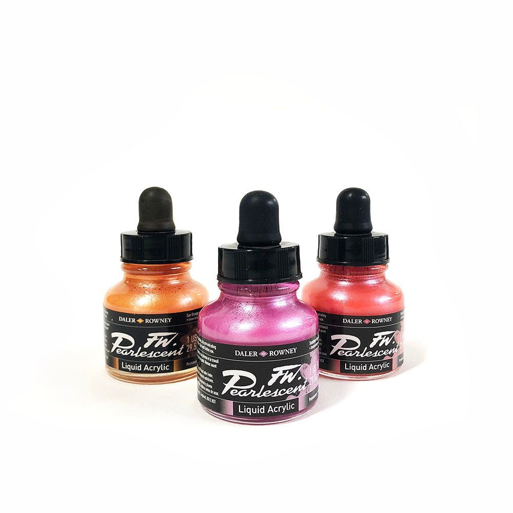 FW Pearlescent Ink 29.5mL. Three cylindrical bottles of Ink with dropper lids centre frame, Colours from left to right, Sun Orange, Sundown Magenta, Volcano Red.